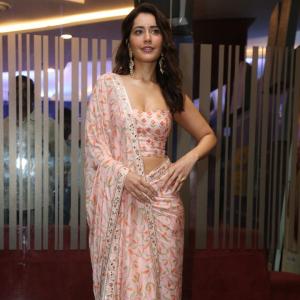 Raashi Khanna Looks Elegant in Pink Floral Saree at Telusu Kada Pre Release Event