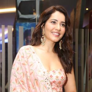Raashi Khanna Looks Elegant in Pink Floral Saree at Telusu Kada Pre Release Event