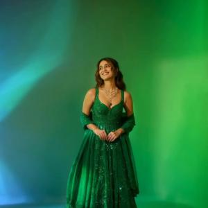 Actress Priya Warrior Dazzles in a Shimmering Green Gown