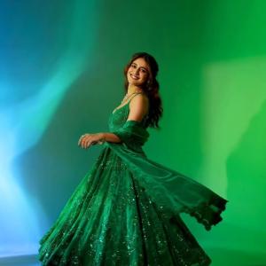 Actress Priya Warrior Dazzles in a Shimmering Green Gown