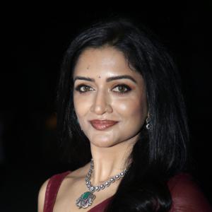 Actress Vimala Raman Exudes Glamour in a Maroon Silk Saree