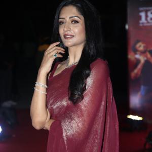 Actress Vimala Raman Exudes Glamour in a Maroon Silk Saree