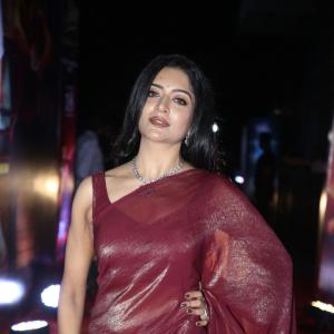 Actress Vimala Raman Exudes Glamour in a Maroon Silk Saree