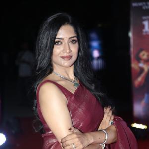 Actress Vimala Raman Exudes Glamour in a Maroon Silk Saree