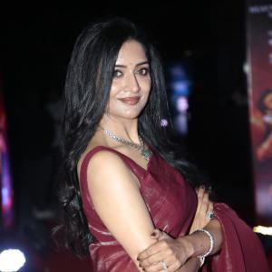 Actress Vimala Raman Exudes Glamour in a Maroon Silk Saree