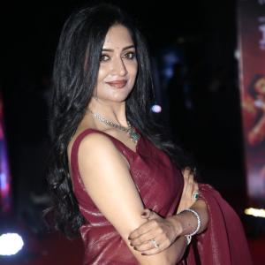 Actress Vimala Raman Exudes Glamour in a Maroon Silk Saree