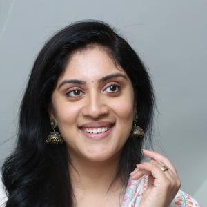 Dhanya Balakrishna Radiates Grace in a Floral White Kurta Look