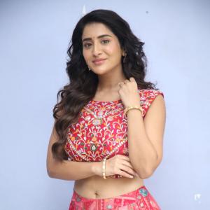 Rashi Singh Stuns in Vibrant Pink Lehenga with Intricate Ethnic Embroidery