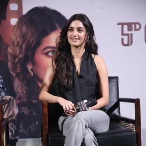 Bhagya Sree Borse Looks Chic in Black Sleeveless Top and Grey Pants at Media Event