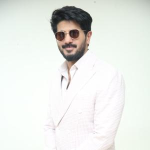 Dulquer Salmaan Looks Stylish in Pastel Blazer and White Trousers | Sophisticated Fashion Look