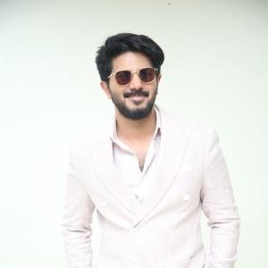Dulquer Salmaan Looks Stylish in Pastel Blazer and White Trousers | Sophisticated Fashion Look