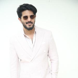 Dulquer Salmaan Looks Stylish in Pastel Blazer and White Trousers | Sophisticated Fashion Look