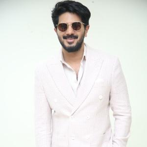 Dulquer Salmaan Looks Stylish in Pastel Blazer and White Trousers | Sophisticated Fashion Look