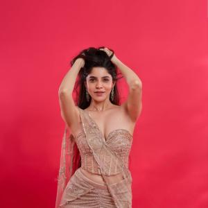 Divya Bharathi Looks Radiant in Elegant Gold Outfit