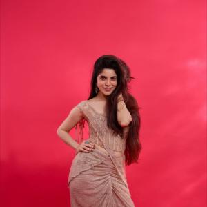 Divya Bharathi Looks Radiant in Elegant Gold Outfit