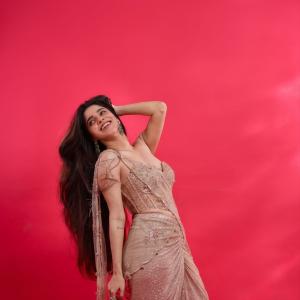 Divya Bharathi Looks Radiant in Elegant Gold Outfit