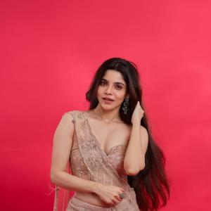 Divya Bharathi Looks Radiant in Elegant Gold Outfit