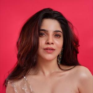 Divya Bharathi Looks Radiant in Elegant Gold Outfit