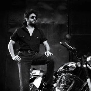 Nagarjuna’s Stylish Rugged Look on Royal Enfield Motorcycle