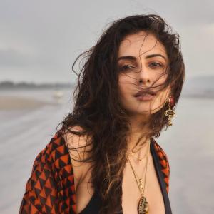 Rakul Preet Singh Stuns in Bold Beachwear Look with Black Cut-Out Outfit