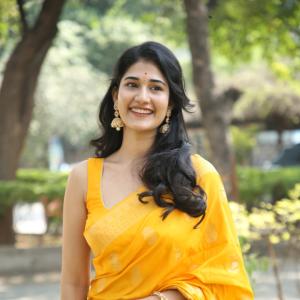 Amrutha Chowdary Shines in a Bright Yellow Saree | Elegant & Graceful Outdoor Photoshoot