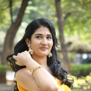 Amrutha Chowdary Shines in a Bright Yellow Saree | Elegant & Graceful Outdoor Photoshoot