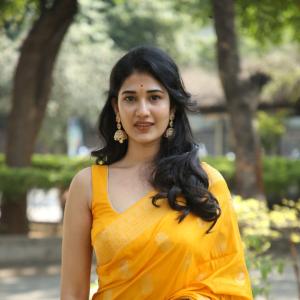Amrutha Chowdary Shines in a Bright Yellow Saree | Elegant & Graceful Outdoor Photoshoot