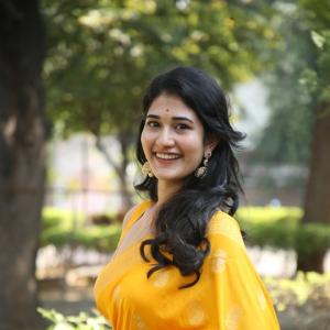 Amrutha Chowdary Shines in a Bright Yellow Saree | Elegant & Graceful Outdoor Photoshoot