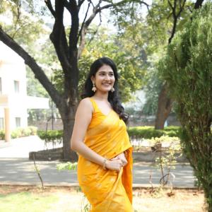 Amrutha Chowdary Shines in a Bright Yellow Saree | Elegant & Graceful Outdoor Photoshoot