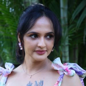 Jyoti Poorvaj Radiates Charm in a Stylish Floral Dress | Outdoor Garden Photoshoot