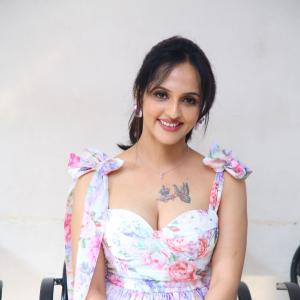 Jyoti Poorvaj Radiates Charm in a Stylish Floral Dress | Outdoor Garden Photoshoot