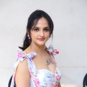 Jyoti Poorvaj Radiates Charm in a Stylish Floral Dress | Outdoor Garden Photoshoot