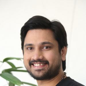 Raj Tharun’s Casual Look: Black Sweatshirt, Denim Style & Warm Smile – Latest Photoshoot