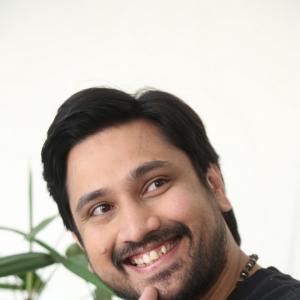 Raj Tharun’s Casual Look: Black Sweatshirt, Denim Style & Warm Smile – Latest Photoshoot