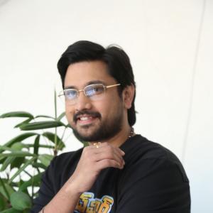 Raj Tharun’s Casual Look: Black Sweatshirt, Denim Style & Warm Smile – Latest Photoshoot