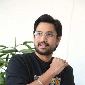 Raj Tharun’s Casual Look: Black Sweatshirt, Denim Style & Warm Smile – Latest Photoshoot