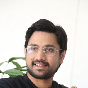 Raj Tharun’s Casual Look: Black Sweatshirt, Denim Style & Warm Smile – Latest Photoshoot