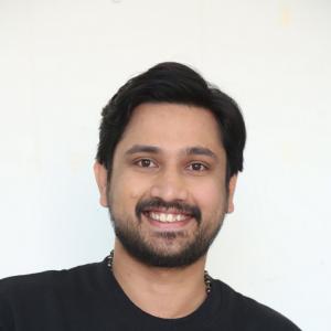 Raj Tharun’s Casual Look: Black Sweatshirt, Denim Style & Warm Smile – Latest Photoshoot