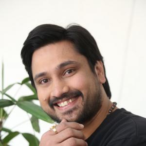 Raj Tharun’s Casual Look: Black Sweatshirt, Denim Style & Warm Smile – Latest Photoshoot