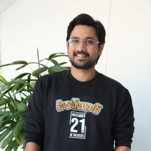 Raj Tharun’s Casual Look: Black Sweatshirt, Denim Style & Warm Smile – Latest Photoshoot