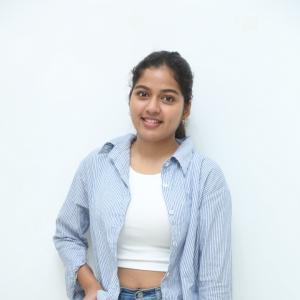 Tejaswi Rao’s Fresh Casual Look in Blue-White Striped Shirt – Latest Photoshoot