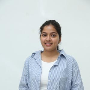 Tejaswi Rao’s Fresh Casual Look in Blue-White Striped Shirt – Latest Photoshoot