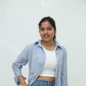 Tejaswi Rao’s Fresh Casual Look in Blue-White Striped Shirt – Latest Photoshoot