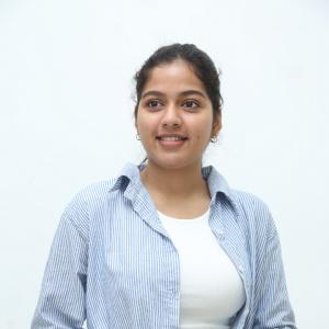 Tejaswi Rao’s Fresh Casual Look in Blue-White Striped Shirt – Latest Photoshoot