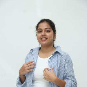 Tejaswi Rao’s Fresh Casual Look in Blue-White Striped Shirt – Latest Photoshoot