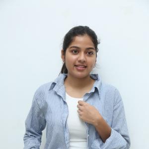 Tejaswi Rao’s Fresh Casual Look in Blue-White Striped Shirt – Latest Photoshoot