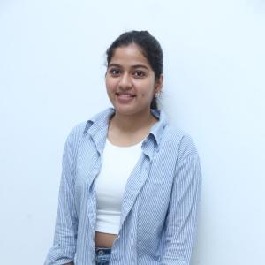 Tejaswi Rao’s Fresh Casual Look in Blue-White Striped Shirt – Latest Photoshoot