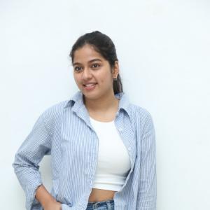 Tejaswi Rao’s Fresh Casual Look in Blue-White Striped Shirt – Latest Photoshoot