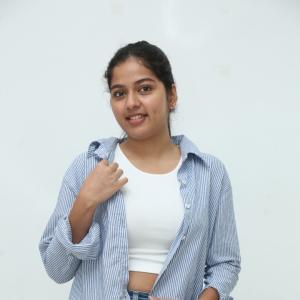Tejaswi Rao’s Fresh Casual Look in Blue-White Striped Shirt – Latest Photoshoot