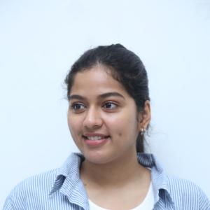 Tejaswi Rao’s Fresh Casual Look in Blue-White Striped Shirt – Latest Photoshoot